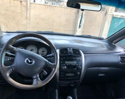 Серый Мазда Премаси, объемом двигателя 2 л и пробегом 200 тыс. км за 4000 $, фото 4 на Automoto.ua