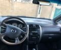 Серый Мазда Премаси, объемом двигателя 2 л и пробегом 200 тыс. км за 4000 $, фото 4 на Automoto.ua
