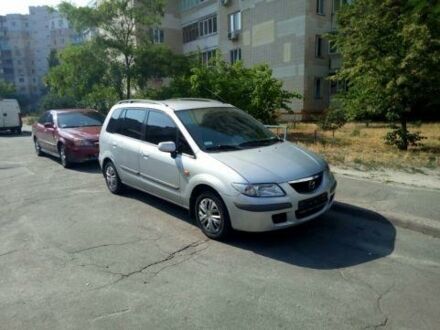 Сірий Мазда Премасі, об'ємом двигуна 1.8 л та пробігом 240 тис. км за 1800 $, фото 1 на Automoto.ua