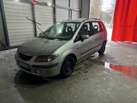 Серый Мазда Премаси, объемом двигателя 2 л и пробегом 300 тыс. км за 1200 $, фото 1 на Automoto.ua