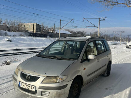 Серый Мазда Премаси, объемом двигателя 2 л и пробегом 245 тыс. км за 1450 $, фото 1 на Automoto.ua