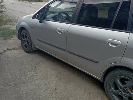 Серый Мазда Премаси, объемом двигателя 2 л и пробегом 200 тыс. км за 3100 $, фото 1 на Automoto.ua