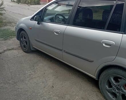 Серый Мазда Премаси, объемом двигателя 2 л и пробегом 200 тыс. км за 3100 $, фото 1 на Automoto.ua