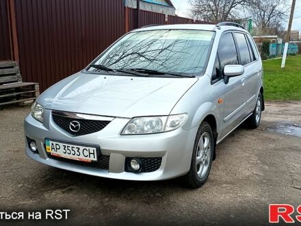 Серый Мазда Премаси, объемом двигателя 1.8 л и пробегом 244 тыс. км за 3700 $, фото 1 на Automoto.ua