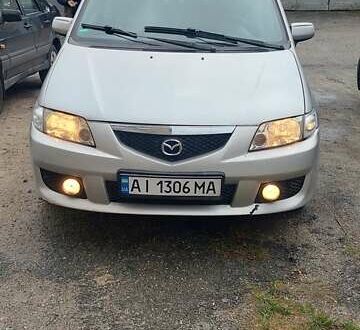 Сірий Мазда Премасі, об'ємом двигуна 2 л та пробігом 250 тис. км за 2800 $, фото 1 на Automoto.ua