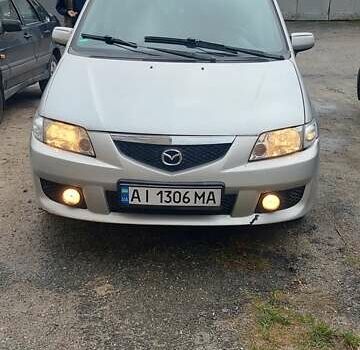 Серый Мазда Премаси, объемом двигателя 2 л и пробегом 250 тыс. км за 2800 $, фото 1 на Automoto.ua