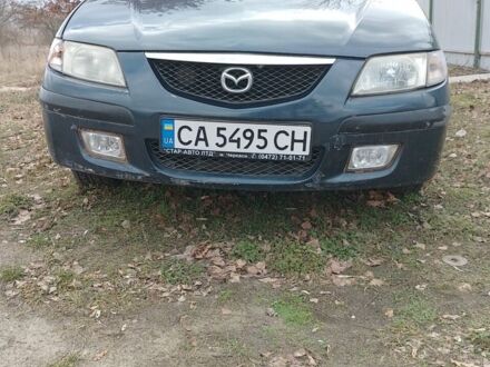 Синий Мазда Премаси, объемом двигателя 1.84 л и пробегом 276 тыс. км за 2673 $, фото 1 на Automoto.ua