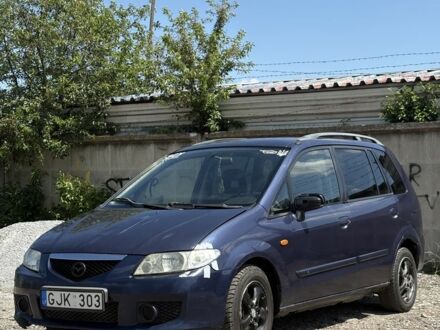 Синий Мазда Премаси, объемом двигателя 2 л и пробегом 240 тыс. км за 1550 $, фото 1 на Automoto.ua