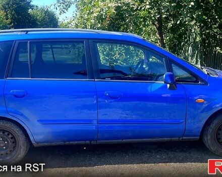 Синій Мазда Премасі, об'ємом двигуна 2 л та пробігом 338 тис. км за 2550 $, фото 1 на Automoto.ua