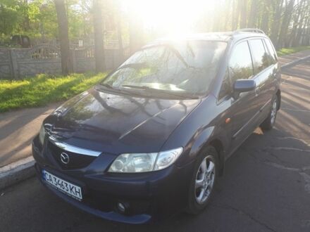 Синий Мазда Премаси, объемом двигателя 2 л и пробегом 264 тыс. км за 1999 $, фото 1 на Automoto.ua