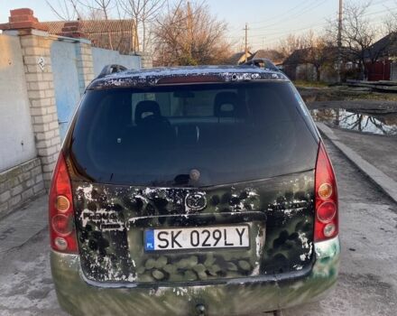 Зеленый Мазда Премаси, объемом двигателя 2 л и пробегом 444 тыс. км за 350 $, фото 4 на Automoto.ua