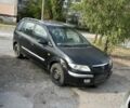 Зеленый Мазда Премаси, объемом двигателя 2 л и пробегом 250 тыс. км за 600 $, фото 1 на Automoto.ua