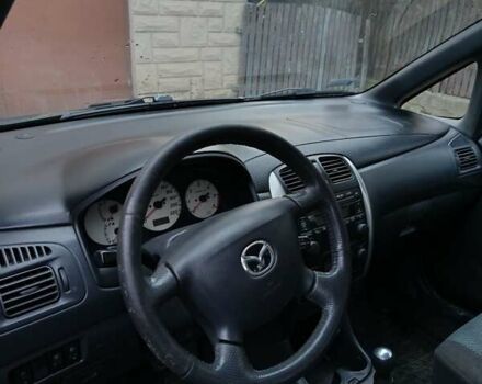 Зелений Мазда Премасі, об'ємом двигуна 2 л та пробігом 296 тис. км за 2100 $, фото 4 на Automoto.ua