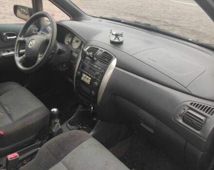 Зеленый Мазда Премаси, объемом двигателя 2 л и пробегом 300 тыс. км за 2200 $, фото 7 на Automoto.ua