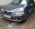 Зелений Мазда Премасі, об'ємом двигуна 2 л та пробігом 200 тис. км за 1496 $, фото 1 на Automoto.ua