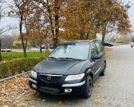 Зеленый Мазда Премаси, объемом двигателя 2 л и пробегом 299 тыс. км за 1200 $, фото 1 на Automoto.ua