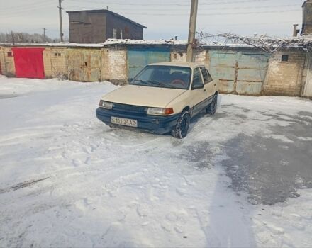 Бежевый Мазда Протеж, объемом двигателя 1.6 л и пробегом 407 тыс. км за 827 $, фото 1 на Automoto.ua