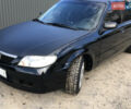 Чорний Мазда Протеже, об'ємом двигуна 1.6 л та пробігом 279 тис. км за 2700 $, фото 1 на Automoto.ua