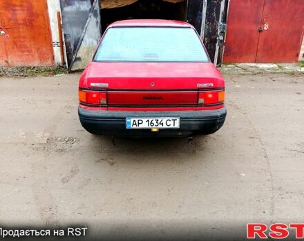 Красный Мазда Протеж, объемом двигателя 1.8 л и пробегом 300 тыс. км за 500 $, фото 2 на Automoto.ua