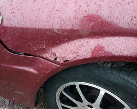 Красный Мазда Протеж, объемом двигателя 1.99 л и пробегом 200 тыс. км за 1500 $, фото 6 на Automoto.ua