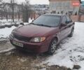 Красный Мазда Протеж, объемом двигателя 1.99 л и пробегом 179 тыс. км за 3500 $, фото 1 на Automoto.ua