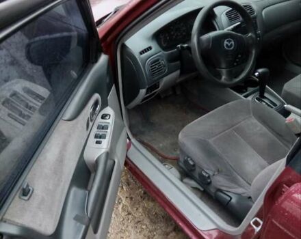 Красный Мазда Протеж, объемом двигателя 1.99 л и пробегом 200 тыс. км за 1500 $, фото 2 на Automoto.ua