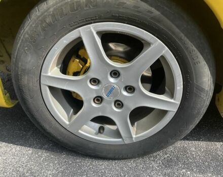 Желтый Мазда Протеж, объемом двигателя 2 л и пробегом 210 тыс. км за 3000 $, фото 7 на Automoto.ua