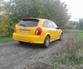 Желтый Мазда Протеж, объемом двигателя 2 л и пробегом 123 тыс. км за 2699 $, фото 5 на Automoto.ua