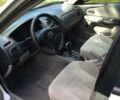 Серый Мазда Протеж, объемом двигателя 2 л и пробегом 220 тыс. км за 3200 $, фото 1 на Automoto.ua