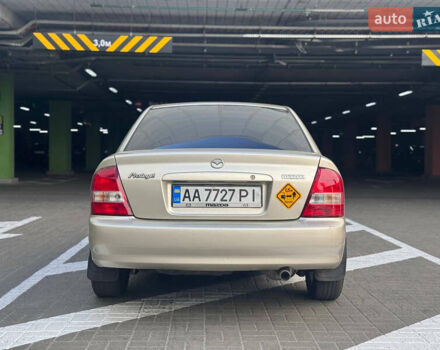 Серый Мазда Протеж, объемом двигателя 2 л и пробегом 85 тыс. км за 3600 $, фото 7 на Automoto.ua