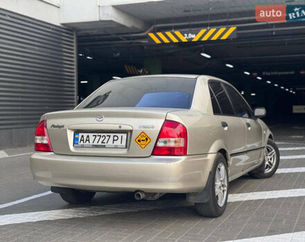 Серый Мазда Протеж, объемом двигателя 2 л и пробегом 85 тыс. км за 3600 $, фото 5 на Automoto.ua