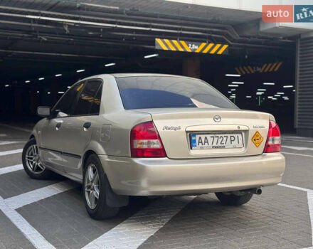 Серый Мазда Протеж, объемом двигателя 2 л и пробегом 85 тыс. км за 3600 $, фото 6 на Automoto.ua