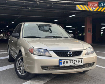 Серый Мазда Протеж, объемом двигателя 2 л и пробегом 85 тыс. км за 3600 $, фото 2 на Automoto.ua