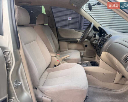 Серый Мазда Протеж, объемом двигателя 2 л и пробегом 85 тыс. км за 3600 $, фото 9 на Automoto.ua