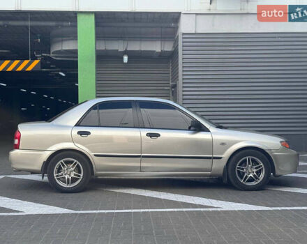 Серый Мазда Протеж, объемом двигателя 2 л и пробегом 85 тыс. км за 3600 $, фото 4 на Automoto.ua