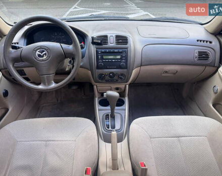 Серый Мазда Протеж, объемом двигателя 2 л и пробегом 85 тыс. км за 3600 $, фото 11 на Automoto.ua