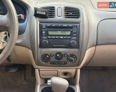 Серый Мазда Протеж, объемом двигателя 2 л и пробегом 85 тыс. км за 3600 $, фото 18 на Automoto.ua