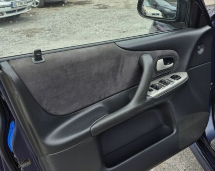 Синій Мазда Протеже, об'ємом двигуна 2 л та пробігом 180 тис. км за 3500 $, фото 7 на Automoto.ua