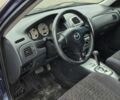 Синій Мазда Протеже, об'ємом двигуна 2 л та пробігом 180 тис. км за 3500 $, фото 14 на Automoto.ua