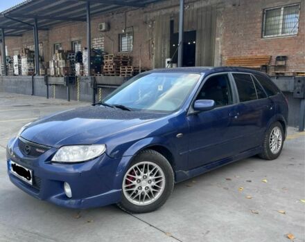 Синий Мазда Протеж, объемом двигателя 2 л и пробегом 298 тыс. км за 3700 $, фото 4 на Automoto.ua