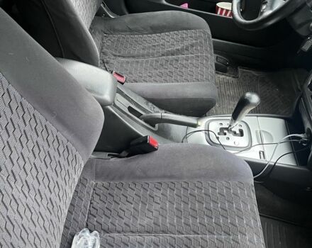 Синий Мазда Протеж, объемом двигателя 2 л и пробегом 298 тыс. км за 3700 $, фото 1 на Automoto.ua