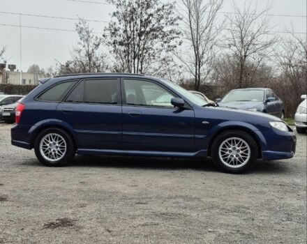 Синій Мазда Протеже, об'ємом двигуна 2 л та пробігом 180 тис. км за 3500 $, фото 5 на Automoto.ua