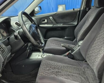 Синій Мазда Протеже, об'ємом двигуна 2 л та пробігом 180 тис. км за 3500 $, фото 8 на Automoto.ua