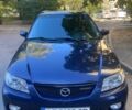 Синий Мазда Протеж, объемом двигателя 2 л и пробегом 290 тыс. км за 3300 $, фото 1 на Automoto.ua
