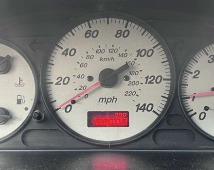 Синий Мазда Протеж, объемом двигателя 2 л и пробегом 298 тыс. км за 3700 $, фото 3 на Automoto.ua