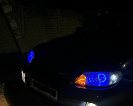 Синій Мазда Протеже, об'ємом двигуна 2 л та пробігом 299 тис. км за 3500 $, фото 9 на Automoto.ua