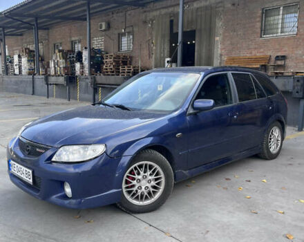 Синій Мазда Протеже, об'ємом двигуна 2 л та пробігом 299 тис. км за 3500 $, фото 4 на Automoto.ua