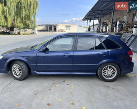 Синій Мазда Протеже, об'ємом двигуна 2 л та пробігом 299 тис. км за 3500 $, фото 5 на Automoto.ua