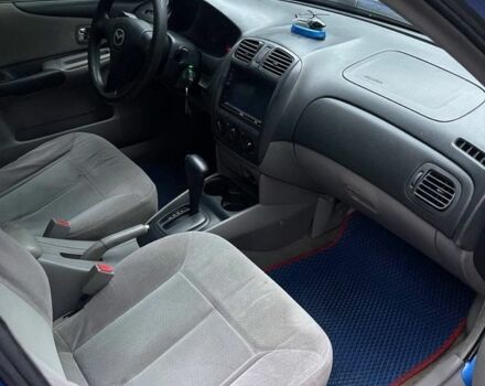 Синий Мазда Протеж, объемом двигателя 2 л и пробегом 220 тыс. км за 2300 $, фото 14 на Automoto.ua