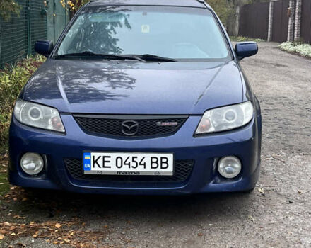 Синий Мазда Протеж, объемом двигателя 2 л и пробегом 299 тыс. км за 3500 $, фото 1 на Automoto.ua